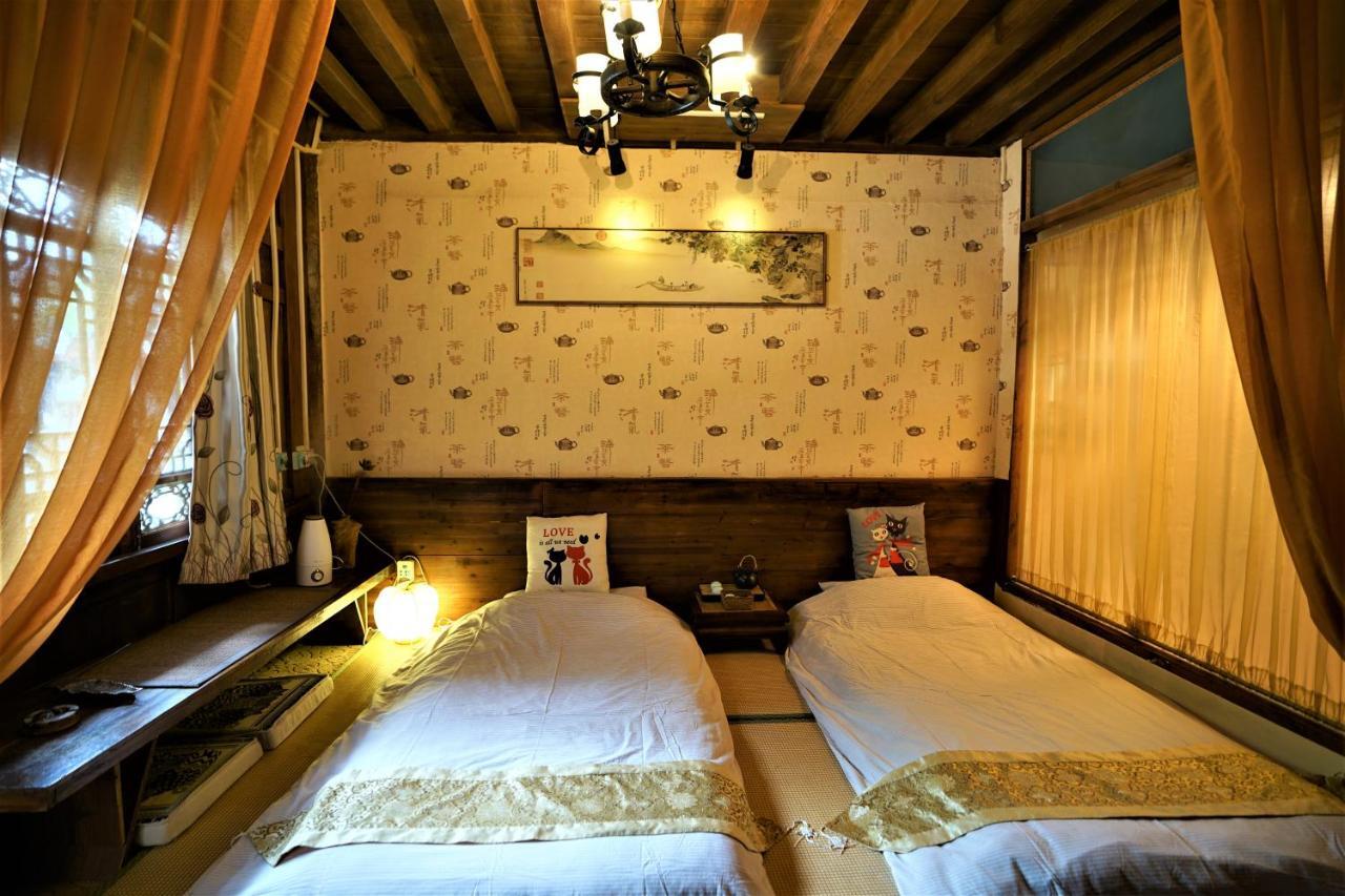 Lv Ye An Jia 绿野安家 Apartman Licsiang Kültér fotó